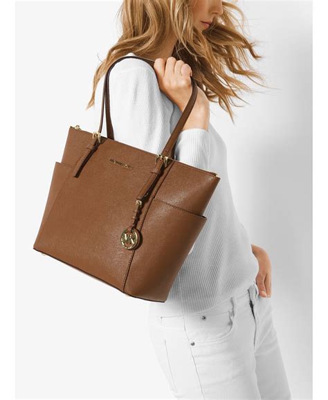 michael kors jet set east west top zip tote review